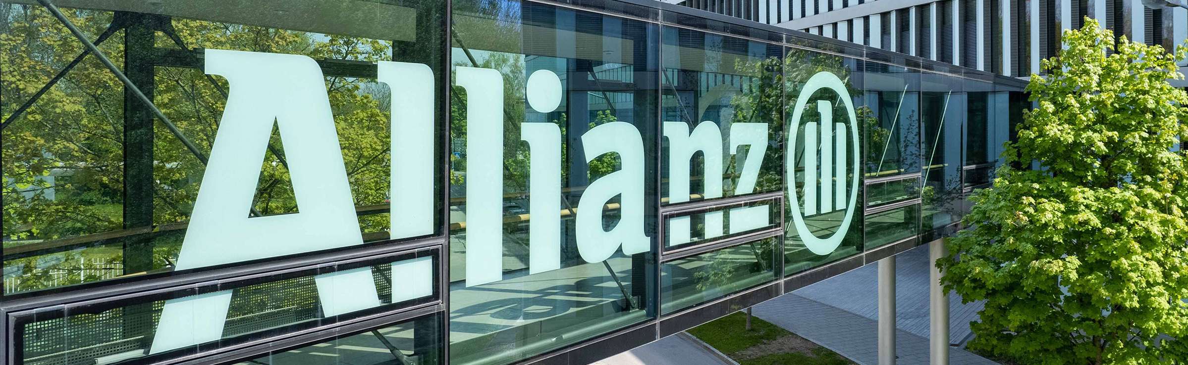 Allianz Pressemitteilung Jeder zweite Lkw-Fahrer schaltet Assistenzsysteme aus: Allianz Unternehmensgebäude